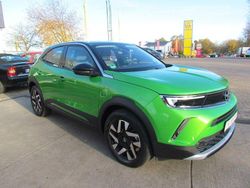 Matcha green (metallic) Gebraucht 2022 Opel Mokka-e Elegance SUV | 19.900 € (Fairer Preis)