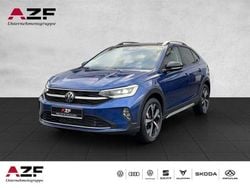 Reef blue metallic / schwarz Gebraucht 2024 VW Taigo Style SUV | 22.890 € (Superpreis)
