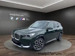 Gruen Neu 2025 BMW iX1 xLine SUV | 51.379 € (Etwas zu teuer)