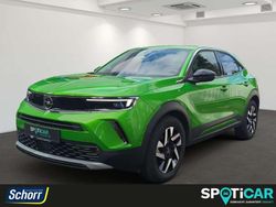 Ikone grün (metallic Gebraucht 2023 Opel Mokka-e Elegance SUV | 22.900 € (Etwas zu teuer)
