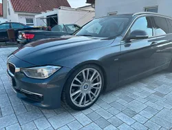 Grau Gebraucht 2014 BMW 335 Comfort Edition Kombi | 11.800 €