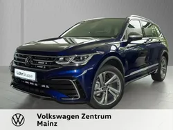 Atlantic blue metallic Gebraucht 2024 VW Tiguan Allspace R-line SUV | 43.770 € (Fairer Preis)