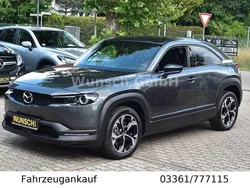 Grau Gebraucht 2024 Mazda MX30 Ad'Vantage SUV | 25.990 € (Guter Preis)
