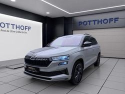 Grau Gebraucht 2024 Skoda Karoq SportLine SUV | 32.443 € (Superpreis)