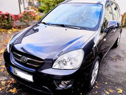 Grau Gebraucht 2009 Kia Carens EX Van / Kleinbus | 3.900 €