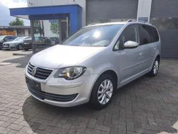 Silber (reflexsilber metallic) Gebraucht 2010 VW Touran Freestyle Van / Kleinbus | 4.980 € (Guter Preis)