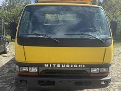Gelb Gebraucht 1996 Mitsubishi Canter Van / Kleinbus | 7.599 €