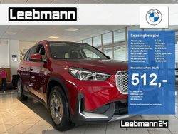 Fire red metallic Neu 2025 BMW iX1 Shadowline SUV | 44.250 € (Superpreis)