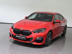 Melbourne rot metallic Gebraucht 2024 BMW 218 Shadowline Limousine | 28.450 € (Fairer Preis)