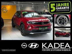 Lackierung rot rubi/typ aussenverkleidun (metallic) Gebraucht 2023 Opel Mokka-e Ultimate SUV | 24.990 € (Teuer)