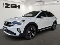 Pure white deep black (metallic) Gebraucht 2022 VW Taigo Style SUV | 21.450 € (Fairer Preis)