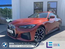Sunset orange Gebraucht 2024 BMW i4 M Sport Limousine | 49.940 € (Guter Preis)