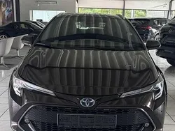 Phantom brown metallic Gebraucht 2019 Toyota Corolla Hybrid Club Kombi | 17.950 € (Guter Preis)