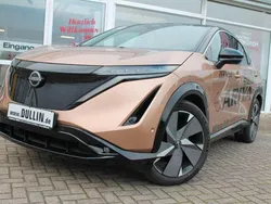 Reddish brown / black Gebraucht 2022 Nissan Ariya Evolve SUV | 48.950 € (Teuer)