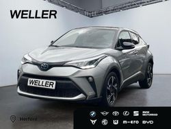 Shimmeringsilber metallic/ dach schwarz Gebraucht 2022 Toyota C-HR Team SUV | 22.980 € (Fairer Preis)