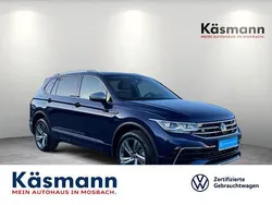 Blau (atlantik blau metallic) Gebraucht 2024 VW Tiguan Allspace R-line SUV | 46.130 € (Fairer Preis)