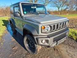 Grau Gebraucht 2024 Suzuki Jimny Comfort SUV | 33.000 € (Teuer)