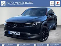 Maroon rouge: 2tone (schwarz) Gebraucht 2024 Mazda MX30 Edition SUV | 29.490 € (Fairer Preis)