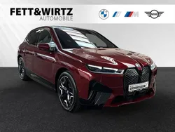 Aventurinrot metallic Gebraucht 2024 BMW iX Sport Line SUV | 75.990 € (Teuer)