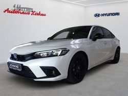 Platinum white pearl Gebraucht 2024 Honda Civic Hybrid Limousine | 40.995 € (Fairer Preis)