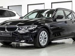 Schwarz ii/bonnet fluid black Gebraucht 2022 BMW 320e Kombi | 20.500 € (Superpreis)