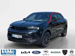 Karbon schwarz (metallic) Gebraucht 2024 Opel Mokka-e SUV | 28.800 € (Teuer)
