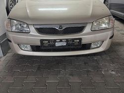 Braun Gebraucht 1999 Mazda 323 Limousine | 1.000 € (Fairer Preis)