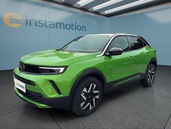 Grün Gebraucht 2024 Opel Mokka SUV | 22.499 € (Etwas zu teuer)
