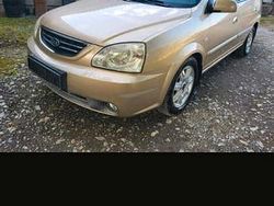 Gelb Gebraucht 2004 Kia Carens EX Van / Kleinbus | 1.400 €