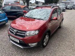 Red of fire (metallic) Gebraucht 2015 Dacia Sandero Prestige Kleinwagen | 5.999 € (Fairer Preis)