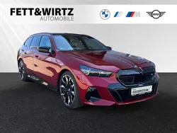 Fire red metallic Gebraucht 2024 BMW i5 Comfort Edition Limousine | 75.500 €