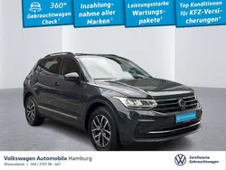 Uranograu Gebraucht 2024 VW Tiguan Life SUV | 27.970 € (Guter Preis)