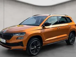 Orange Gebraucht 2024 Skoda Karoq SportLine SUV | 32.990 € (Fairer Preis)