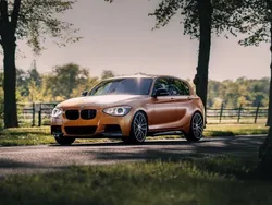 Orange Gebraucht 2013 BMW M135 Sport Line Kleinwagen | 22.800 € (Fairer Preis)