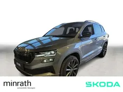 Grau Gebraucht 2024 Skoda Karoq SportLine SUV | 37.500 € (Fairer Preis)