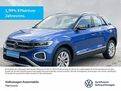 Ravennablau metallic/schwarz Gebraucht 2024 VW T-Roc Style SUV | 23.380 € (Guter Preis)