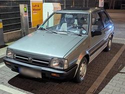 Grau Gebraucht 1989 Nissan Micra Kleinwagen | 2.200 €