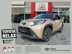 Ginger beige (4u9)/ black mica Gebraucht 2023 Toyota Aygo Pulse Kleinwagen | 15.990 € (Fairer Preis)