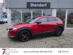 Soul red crystal m Gebraucht 2024 Mazda CX-30 Homura-Line SUV | 28.340 € (Fairer Preis)