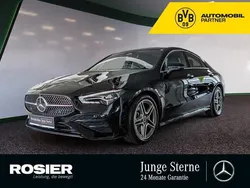 Schwarz / kosmosschwarz (metallic) Gebraucht 2024 Mercedes CLA200 AMG Coupé | 36.878 € (Fairer Preis)