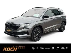 Grau Gebraucht 2024 Skoda Karoq SportLine SUV | 37.490 € (Teuer)
