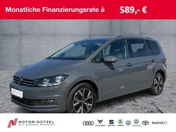Delfingrau metallic Gebraucht 2024 VW Touran Move Van / Kleinbus | 45.270 €