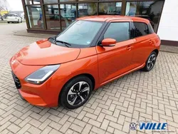 Flame orange pearl Gebraucht 2025 Suzuki Swift Comfort+ Limousine | 18.990 € (Etwas zu teuer)