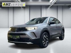 Kontrast grau/quarz silber (metallic) Gebraucht 2023 Opel Mokka Elegance SUV | 17.900 € (Fairer Preis)