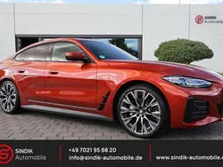 Sunset orange Gebraucht 2023 BMW i4 M Sport Limousine | 44.980 € (Fairer Preis)