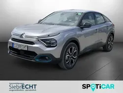 Grau Gebraucht 2023 Citroën e-C4 Feel Limousine | 21.970 € (Guter Preis)
