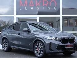 Grau Gebraucht 2024 BMW X6 M Sport SUV | 91.970 € (Etwas zu teuer)