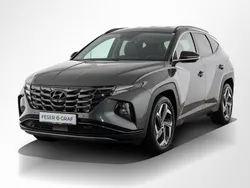 Grau Gebraucht 2021 Hyundai Tucson Prime SUV | 23.950 € (Fairer Preis)