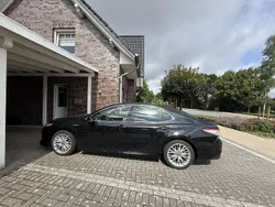 Schwarz Gebraucht 2021 Toyota Camry Hybrid Executive Limousine | 32.999 €
