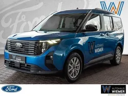 Desert island blue Gebraucht 2024 Ford Tourneo Courier Titanium Van / Kleinbus | 29.470 € (Etwas zu teuer)